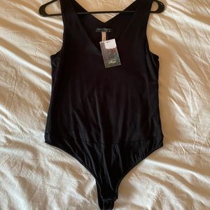 Black body suit, never worn